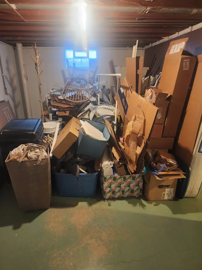 Roll-off dumpster container at job site for 2 Yard Dumpster Rental in Edgmont